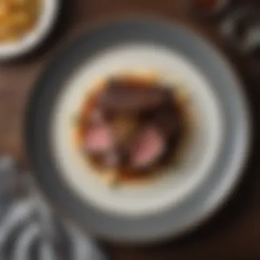 A beautifully arranged plate of short ribs with garnish and sides