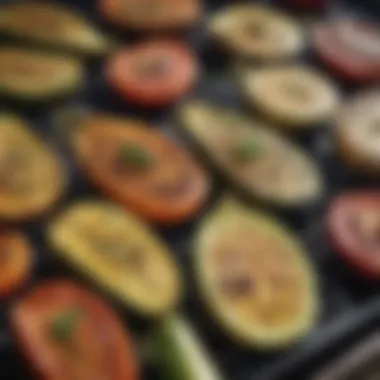 Grilled vegetables resting on a BBQ grill pan with holes