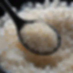 A close-up view of luxurious beluga caviar grains glistening on a mother-of-pearl spoon.
