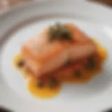 Elegant presentation of salmon topped with a vibrant caper sauce