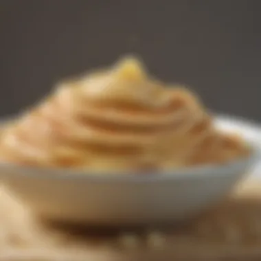 Pancake Batter Texture A close-up shot of a bowl filled with pancake batter, showcasing the smooth texture and inviting color.