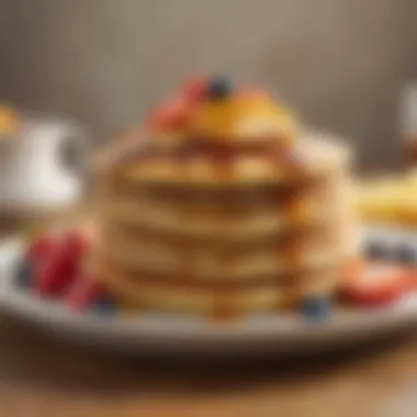 A stack of golden-brown pancakes, perfectly cooked and garnished with fresh fruits and syrup.