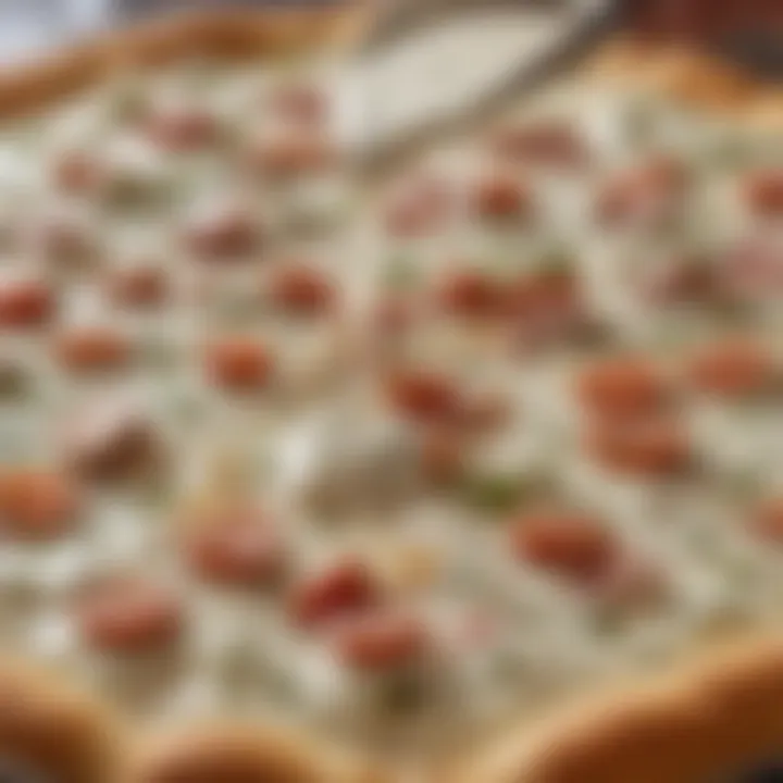 Aromatic ranch dressing drizzled on pizza