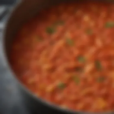 Simmering marinara sauce in a pot