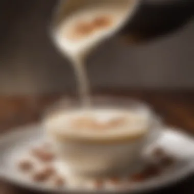 Close-up of frothy almond milk being poured over espresso