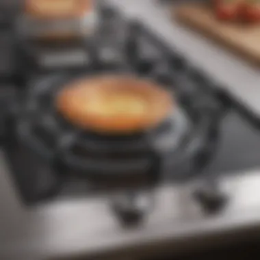 A close-up of a gas stove top showcasing cleanliness and shine Detailed view of a gas stove top