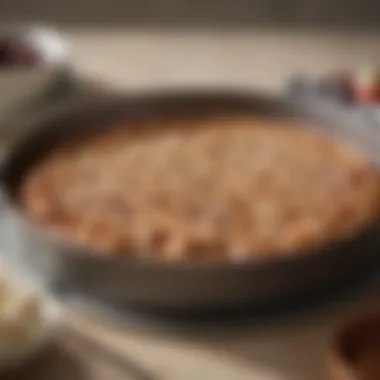 Close-up of a round cake pan with detailed care instructions.