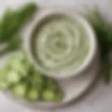 A vibrant bowl of cucumber dip garnished with fresh dill