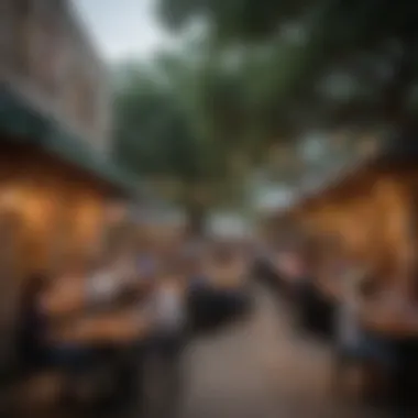 A bustling street filled with diners enjoying outdoor seating in Austin