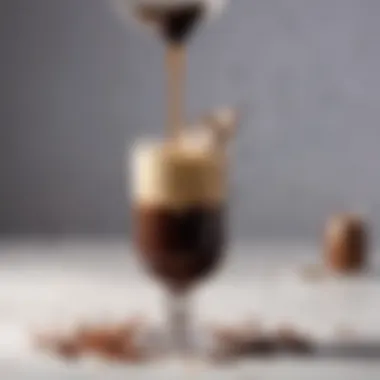 A close-up shot of a glass of Baileys Irish Cream with a drizzle of chocolate syrup