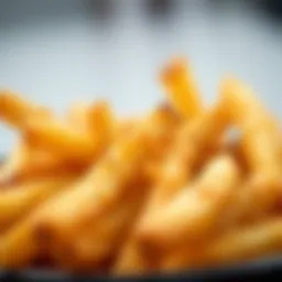 A close-up of perfectly fried golden French fries showcasing their crispy texture