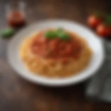 A rustic plate of spaghetti topped with a rich tomato sauce and basil