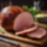 A beautifully glazed smoked ham on a wooden board