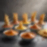 An array of various French fry sauces in elegant bowls