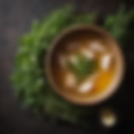 Organic chicken broth in a rustic bowl with herbs