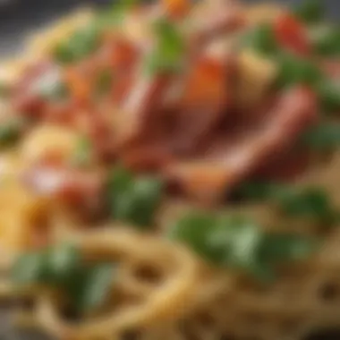 Crispy Bacon on Pasta Close-up of crispy bacon pieces atop a bed of pasta and greens.