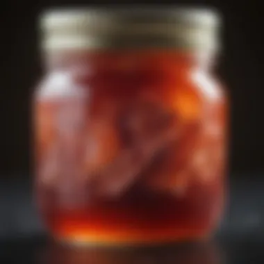 A close-up of bacon jelly glistening in a jar