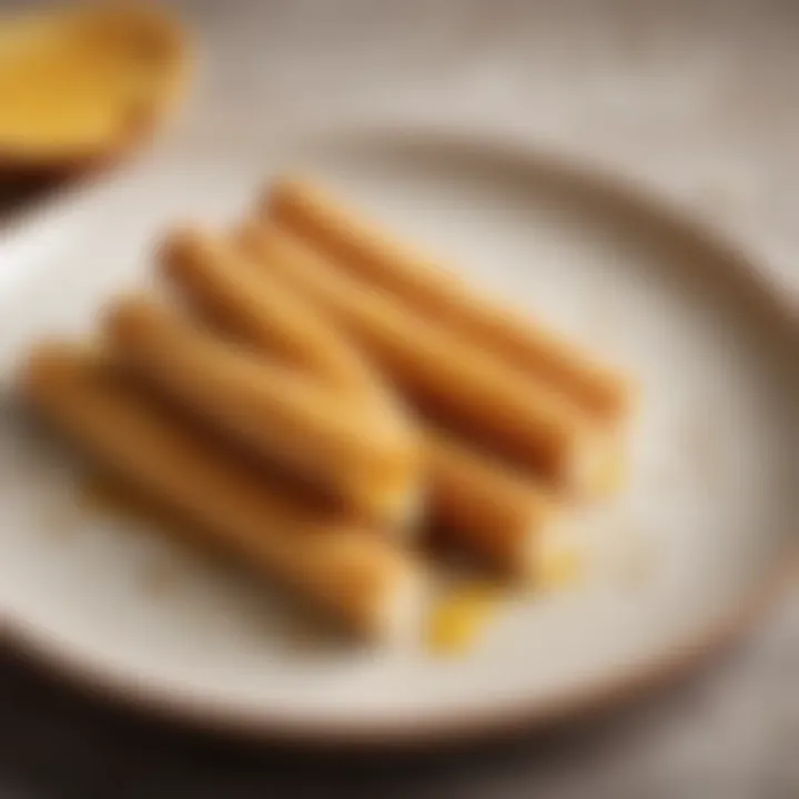 A close-up of golden-brown frozen cheese sticks arranged elegantly on a plate, showcasing their texture.