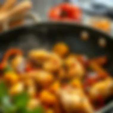 Sizzling garlic chicken in a wok with colorful vegetables
