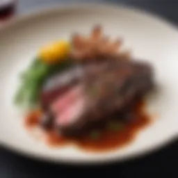 A beautifully seared hanger steak on a plate