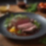 A beautifully plated venison dish garnished with fresh herbs
