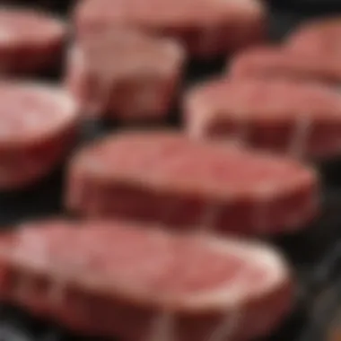 A close-up of raw minute steaks ready for grilling