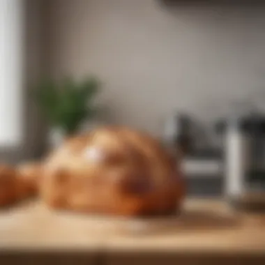 Freshly baked loaf of bread produced by the Mr. Coffee Breadmaker on a kitchen countertop.