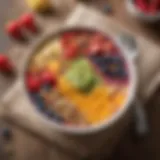 Vibrant smoothie bowl topped with fresh fruits and nuts
