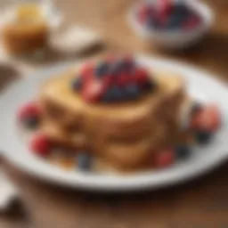 A beautifully plated sourdough French toast topped with fresh berries and a drizzle of maple syrup