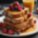 Golden-brown French toast topped with fresh berries and syrup