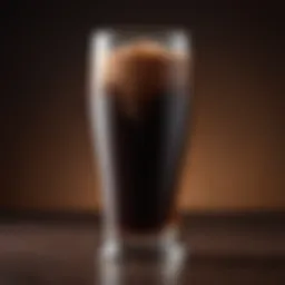 A close-up of a glass filled with rich chocolate stout, showcasing its dark color and creamy head.