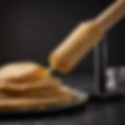 Detailed view of a crepe maker stick showcasing its unique design.