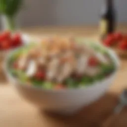 A vibrant bowl of chicken salad with fresh ingredients