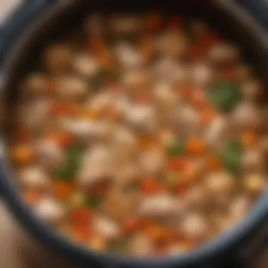 Crockpot filled with seasoned chicken and vegetables