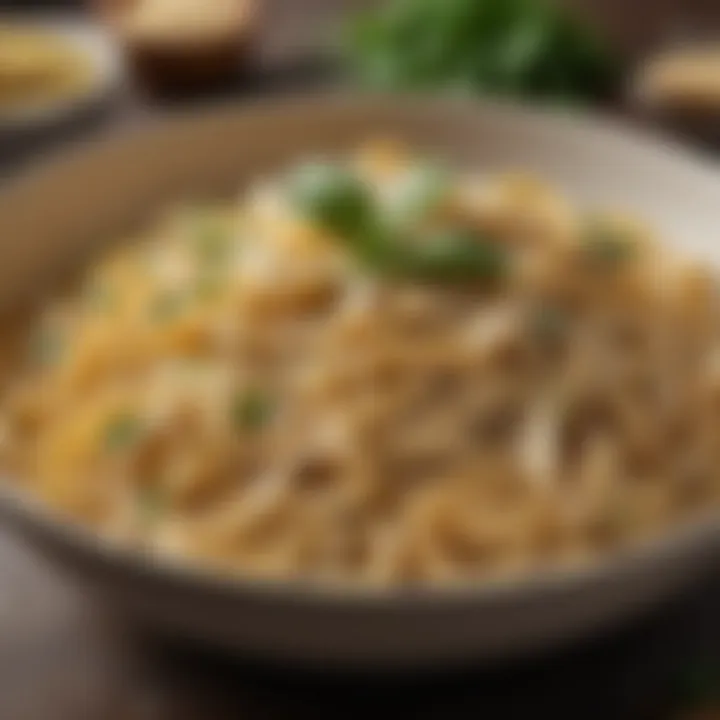 A bowl of whole wheat fettuccini garnished with fresh herbs and grated cheese