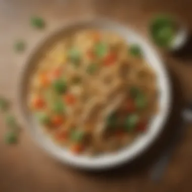 A vibrant plate of whole wheat fettuccini served with seasonal vegetables